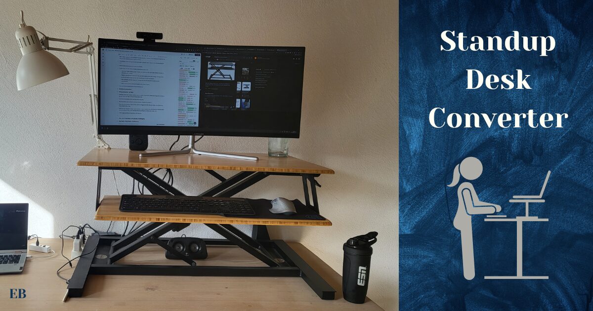 A standup desk converter with a monitor, keyboard, and mouse set up, with the text "Standup Desk Converter" next to an illustration of a person using a standing desk.
